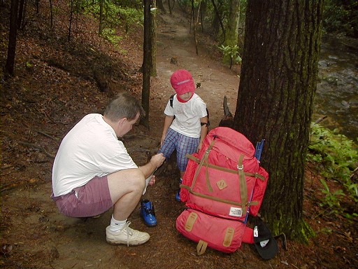 20 - Adjusting socks on the trail