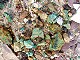 46 - Stones green from copper