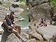 13 - Barb & Jen sitting on boulders